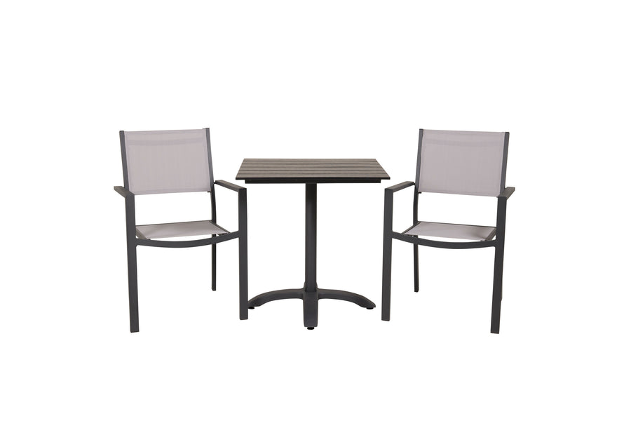 De eettafel Colorado met de stoelen Copacabana 
