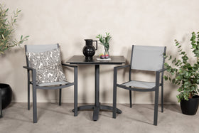 De eettafel Colorado met de stoelen Copacabana 