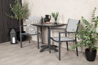 De eettafel Colorado met de stoelen Copacabana 